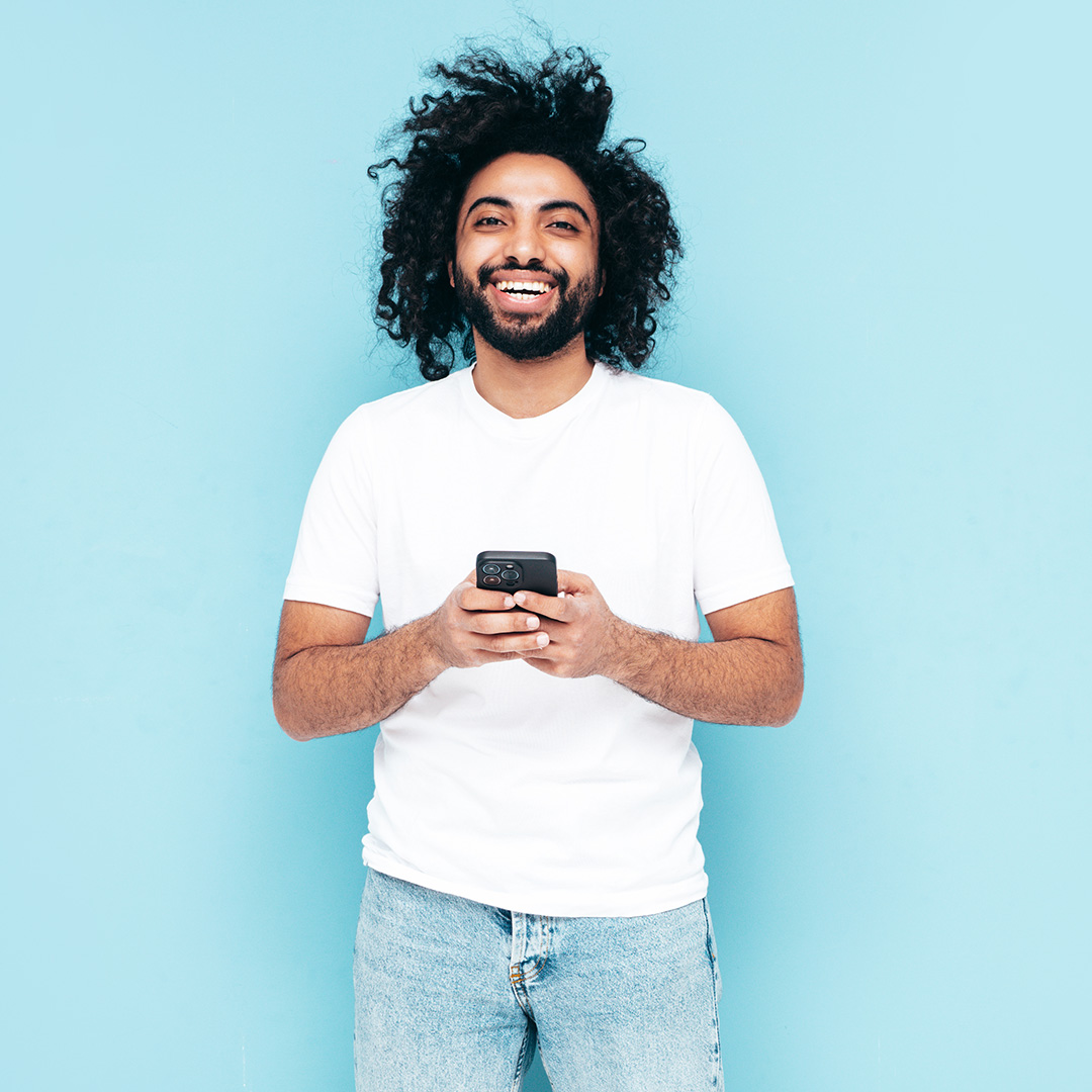 handsome smiling hipster man posing in studio 2022 04 27 02 49 27 utc